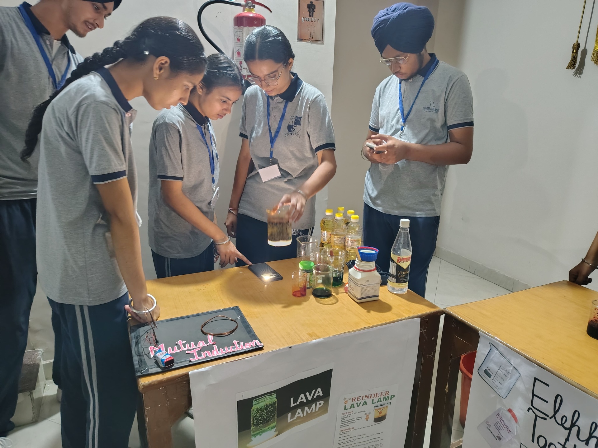 Senior students demonstrating a lava lamp experiment